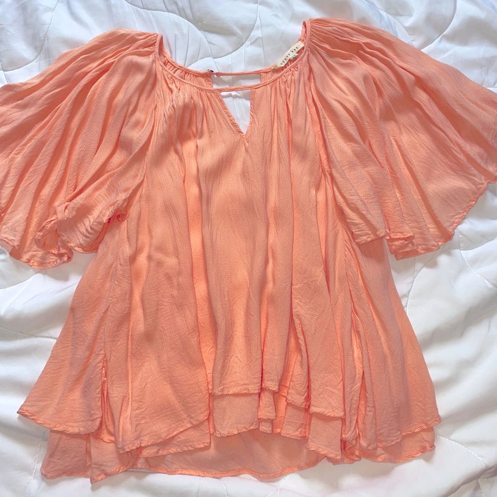 Baby pink short sleeve blouse with flowy sleeves